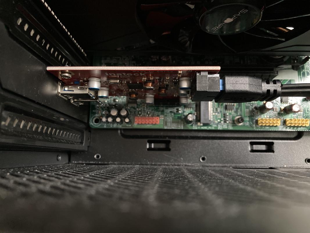 PCIe to USB 3.0 internal header adapter, and dust.