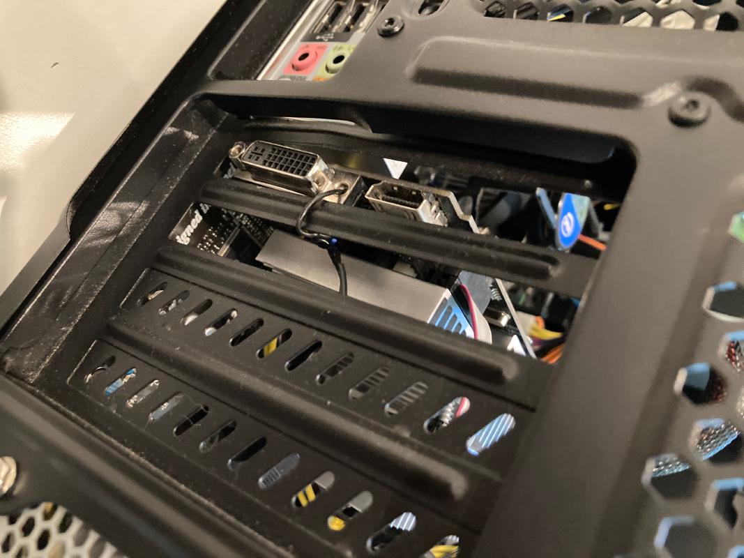 This GPU was held in place with a piece of wire.